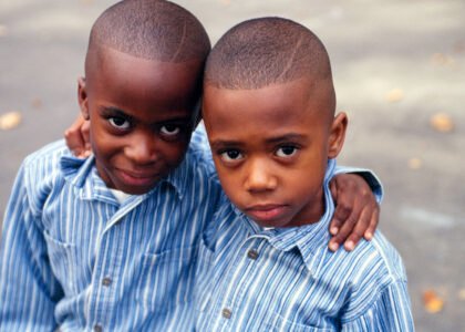 Brothers arm in arm